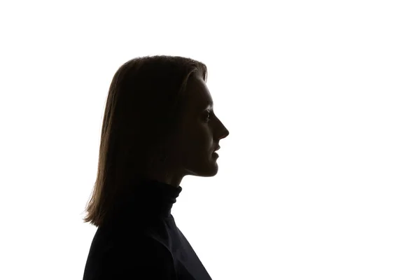 Silueta de mujer con cabello liso aislado sobre blanco - foto de stock