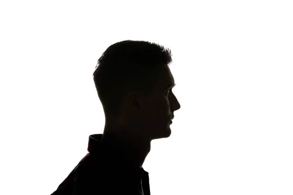 Silhouette of man looking away isolated on white — Stock Photo