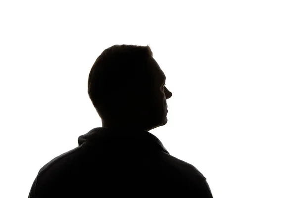 Silhouette d'homme regardant loin isolé sur blanc — Photo de stock