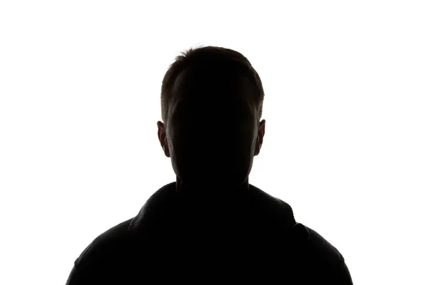 Silhouette eines Mannes, der isoliert auf weiße Kamera blickt — Stockfoto