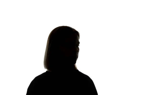 Silhouette of woman looking away isolated on white — Stock Photo