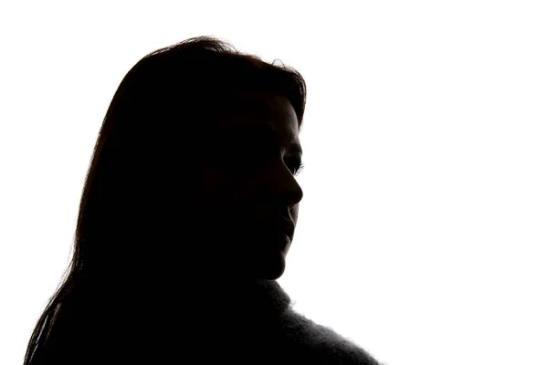 Silhouette einer Frau, die isoliert auf Weiß wegschaut — Stockfoto