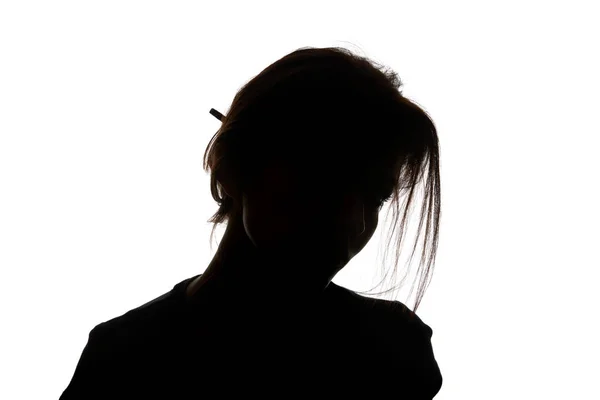 Silhouette de femme regardant la caméra isolée sur blanc — Photo de stock
