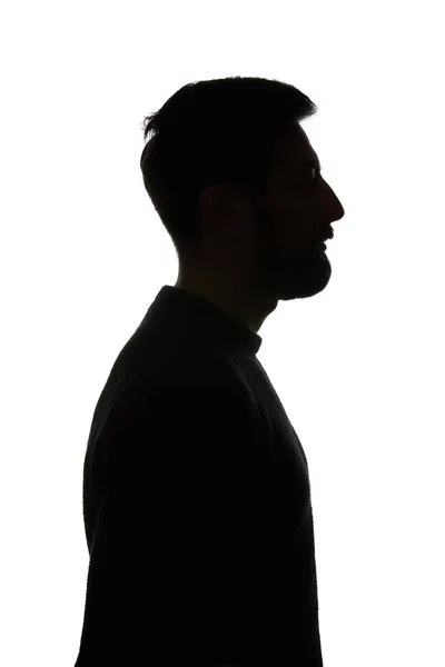 Vista lateral del hombre mirando hacia otro lado aislado en blanco - foto de stock