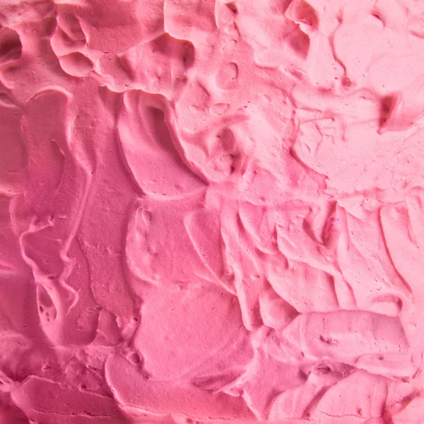 Close up of pink cream on tasty baked cake — Stock Photo