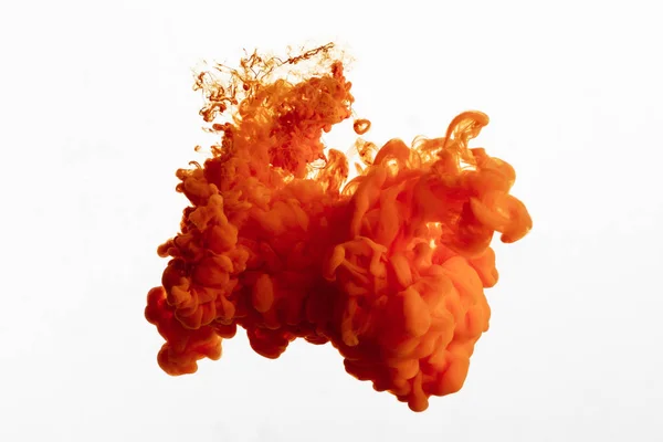 Close up view of orange paint splash isolated on white — Stock Photo