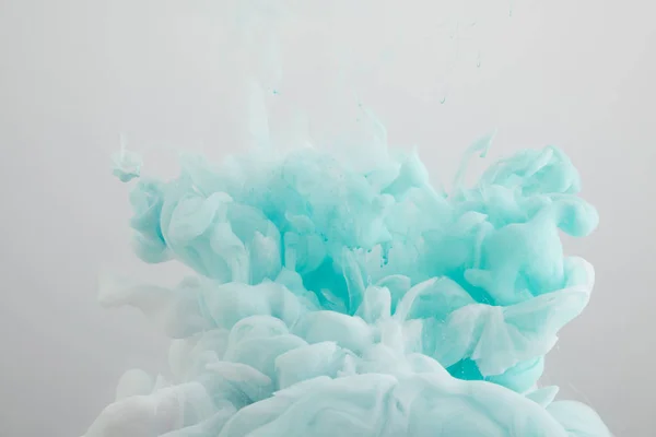 Close up view of light blue paint splash isolated on grey — Stock Photo