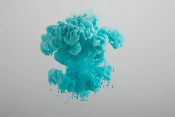 Respingo de tinta azul isolado no cinza — Fotografia de Stock