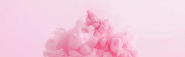 Close up view of pink paint swirls isolated on pink — Stock Photo