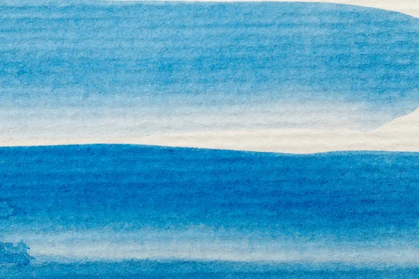 Bleu aquarelle peinture coups de pinceau sur fond papier texturé blanc — Photo de stock