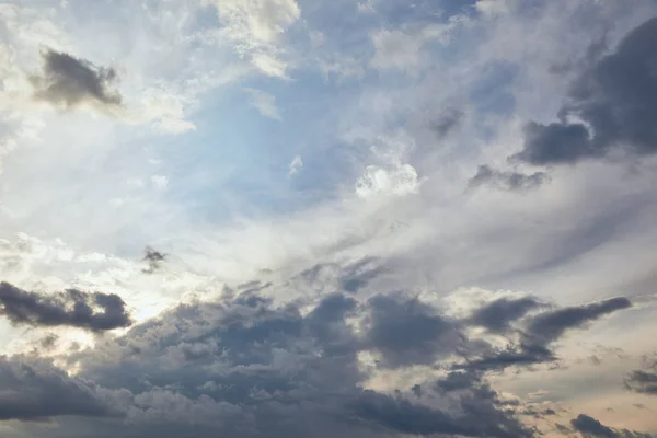 Blue clouds on blue sunlight sky background and copy space — Stock Photo