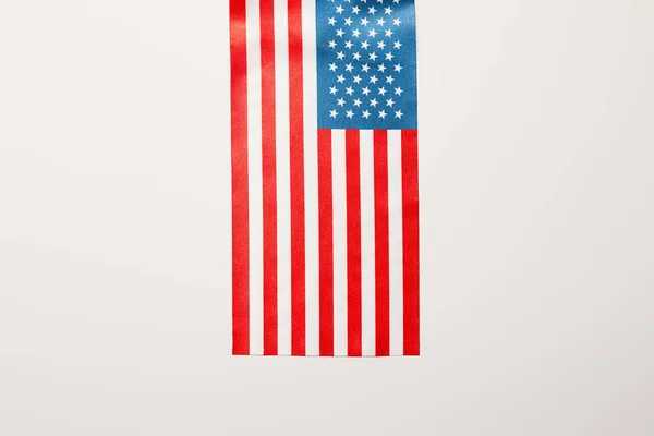 Top view of usa flag on white background with copy space — Stock Photo