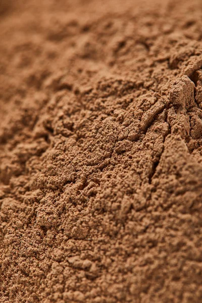 Vue rapprochée de poudre d'argile texturée brune — Photo de stock