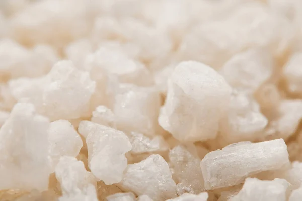 Close up view of white textured granulated sea salt — Stock Photo