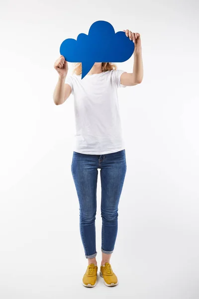 Woman with blue thought bubble in hands standing isolated on white — Stock Photo