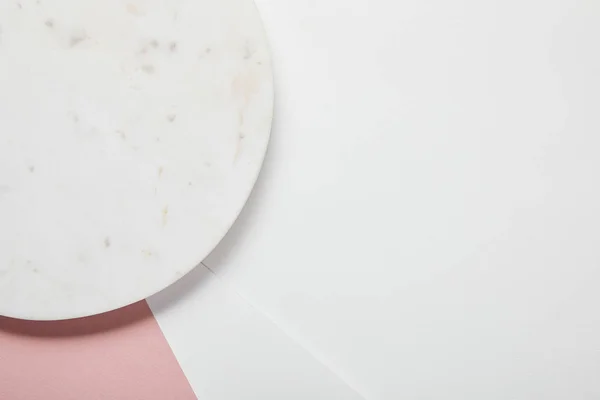 Top view of plate on white pink surface — Stock Photo