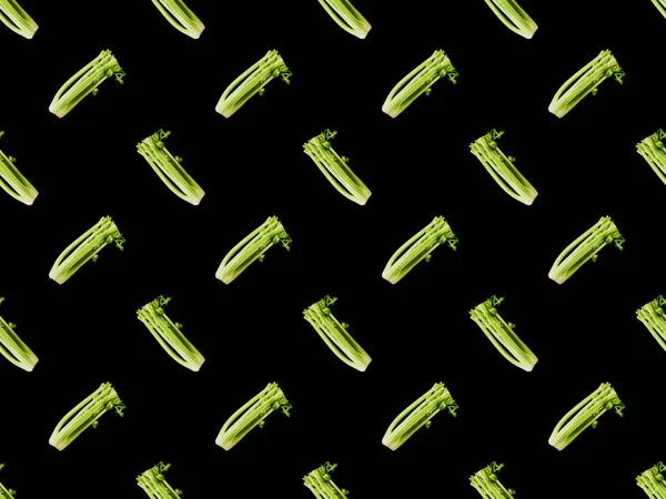 Fresh green leek isolated on black, seamless background pattern — Stock Photo