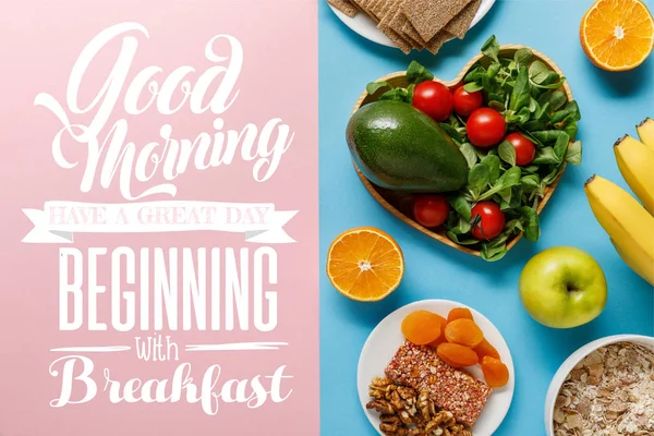 Top view of diet food on blue and pink background with with with good morning, have a great day beginning with breakfast lettering — стоковое фото