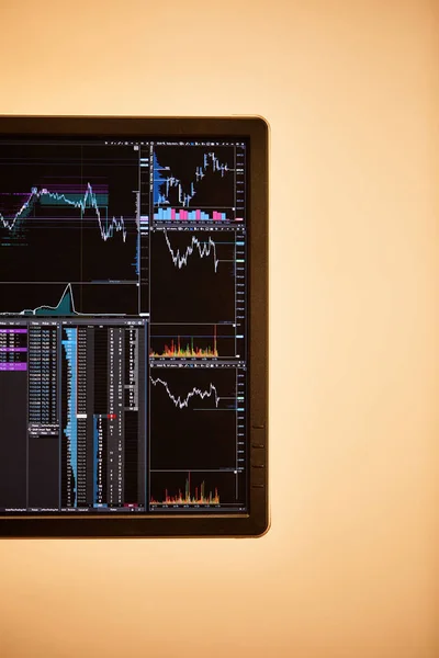 Screen of digital device with charts and graphs in office — Stock Photo