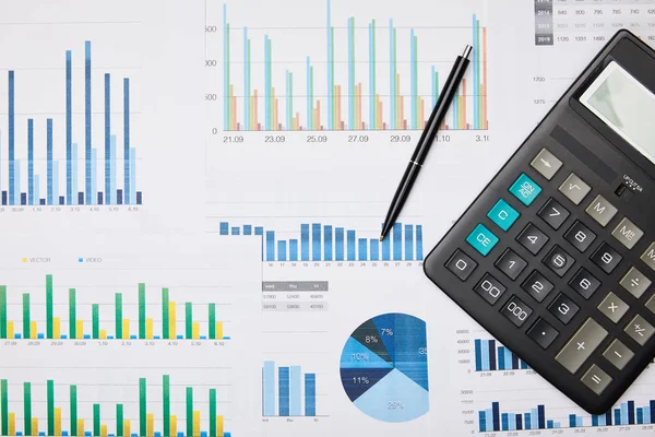 Top view of papers, pen and calculator on table — Stock Photo