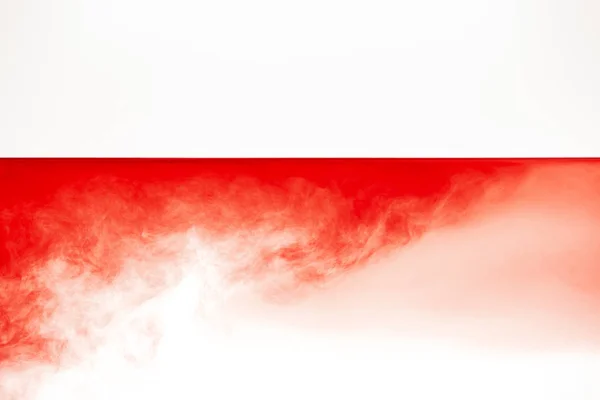 Abstract red cloud in smooth calm liquid isolated on white — Stock Photo