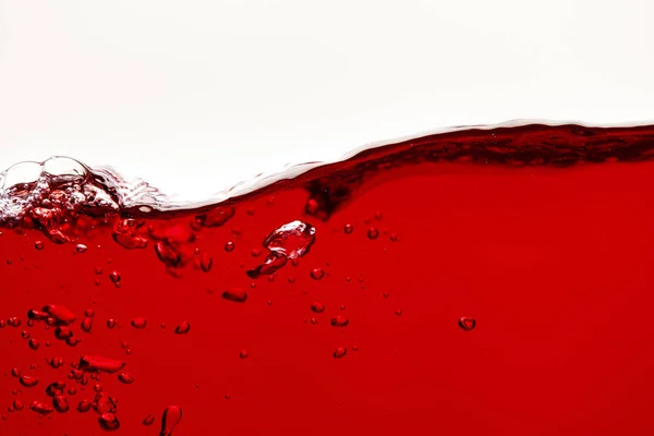 Red bright wave with bubbles isolated on white — Stock Photo