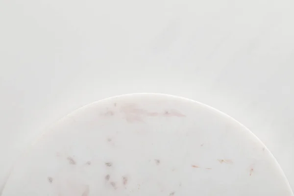 Empty flat round marble surface on white background — Stock Photo