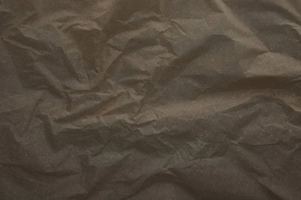 Vista superior de la superficie de papel pergamino desmenuzado beige oscuro con espacio para copiar — Stock Photo