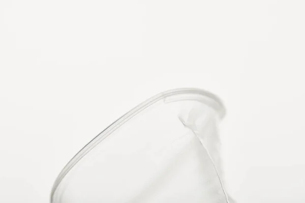 Close up view of transparent plastic cup on white background — Stock Photo