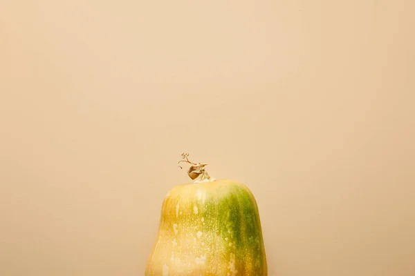 Top view of ripe whole pumpkin isolated on beige — Stock Photo