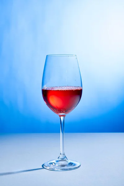 Cocktail Aperol Spritz in glass on blue background with copy space — Stock Photo