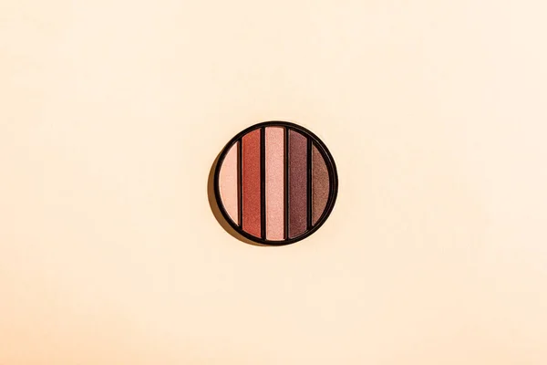 Top view of eye shadow palette isolated on pink — Stock Photo