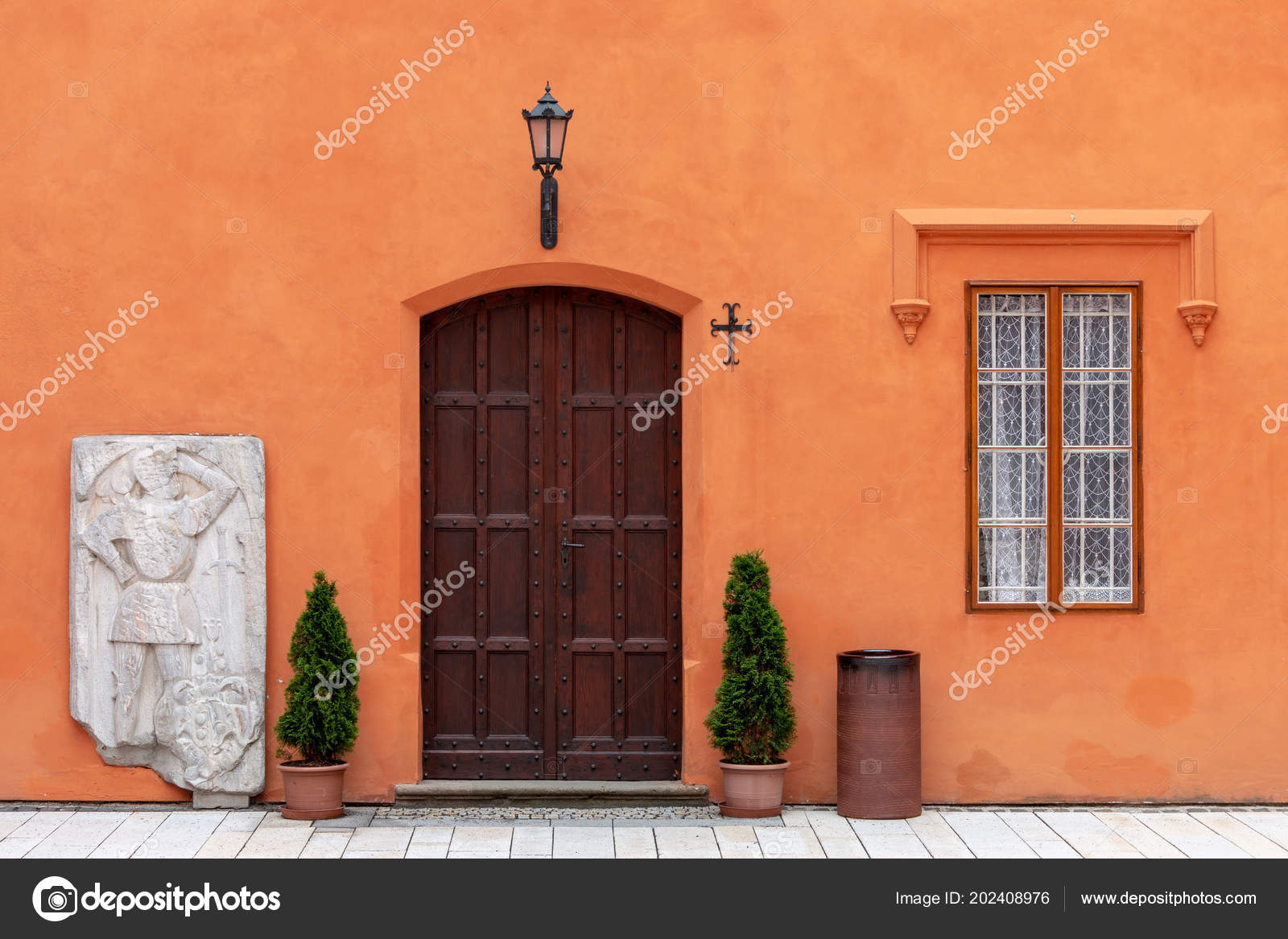 Door Orange Wall Marble Sculpture Potted Plants Window