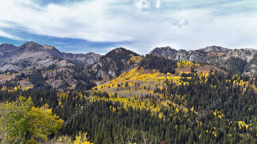 Guardsman Pass views of Panoramic Landscape of the Pass from the Brighton side by Midway and Heber Valley along the Wasatch Front Rocky Mountains, Fall Leaf Forests bright orange and yellow colors. Utah, United States.