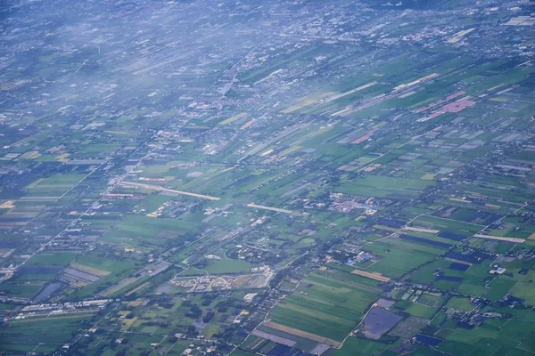 Aerial view of Bangkok Thailand and surrounding landscape, modern office buildings, condominium, living place in Bangkok city downtown in the most populated. Southeast Asia.