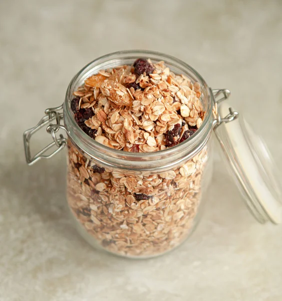 Homemade Muesli Glass Jar Beige Textured Background — Stock Photo, Image