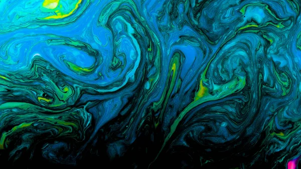 Bright psychedelic dyes mixed in black liquid, abstract patterns