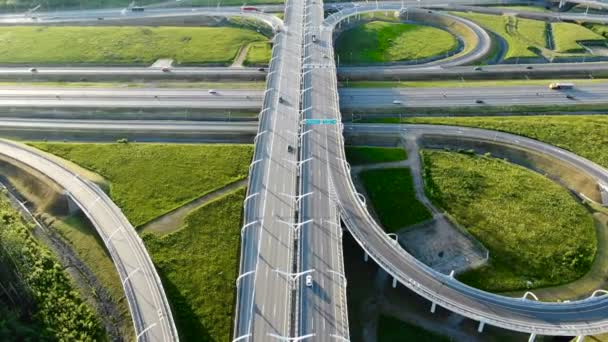 Turning circle with driving lane lit by morning sunlight — Stock Video