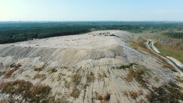 Giant city dump in the woods, aerial view — Stock Video