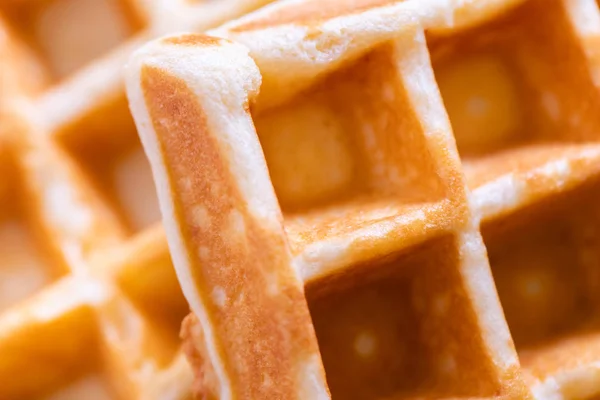 woman hands prepare waffle for serving process.waffle made from