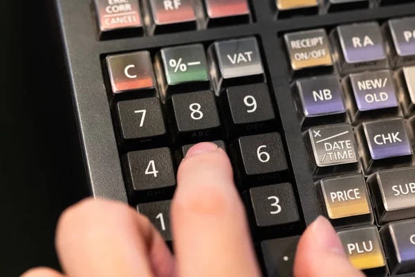 cash register installed on counter for accepting order from cust