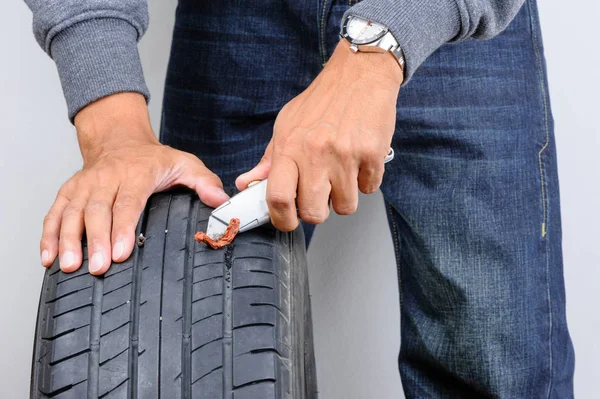Man Repairing Flat Car Tire Repair Kit Tire Plug Repair — Stock Photo, Image