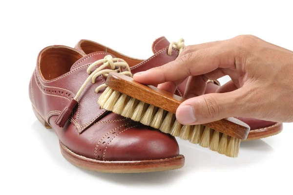 the horsehair brush for leather shoe polishing.