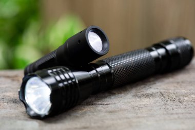 pocket flashlight for Everyday Carry (EDC), shallow depth of field clipart