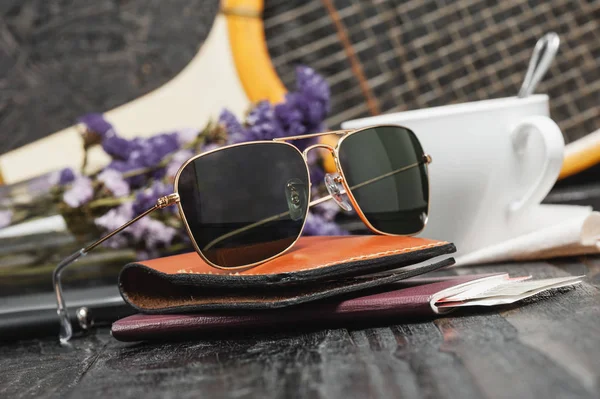 men accessories, closeup sunglasses with gold frame.