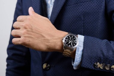 wristwatch on wrist