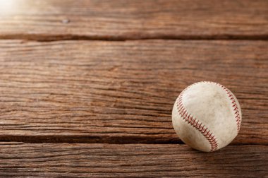 baseball on wooden desk clipart