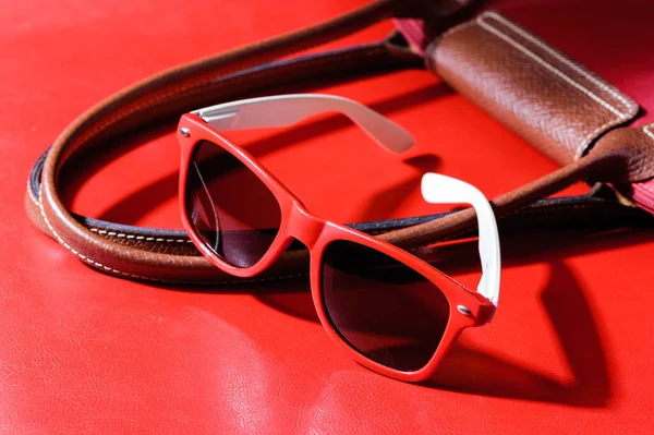 Woman Accessory Closeup Red Plastic Sunglasses Red Background — Stock Photo, Image