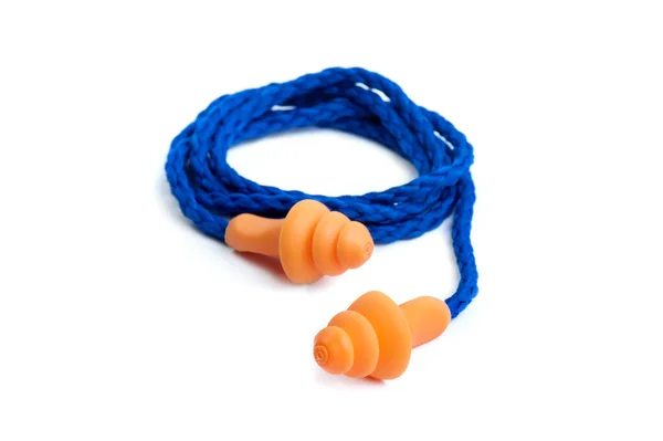 白の背景にオレンジ再利用可能な耳栓 個人用安全装置 — ストック写真