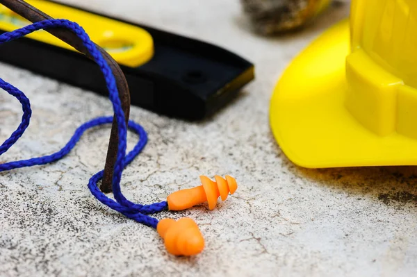 Orange Reusable Ear Plugs Construction Site Personal Safety Equipment Concept — Stock Photo, Image